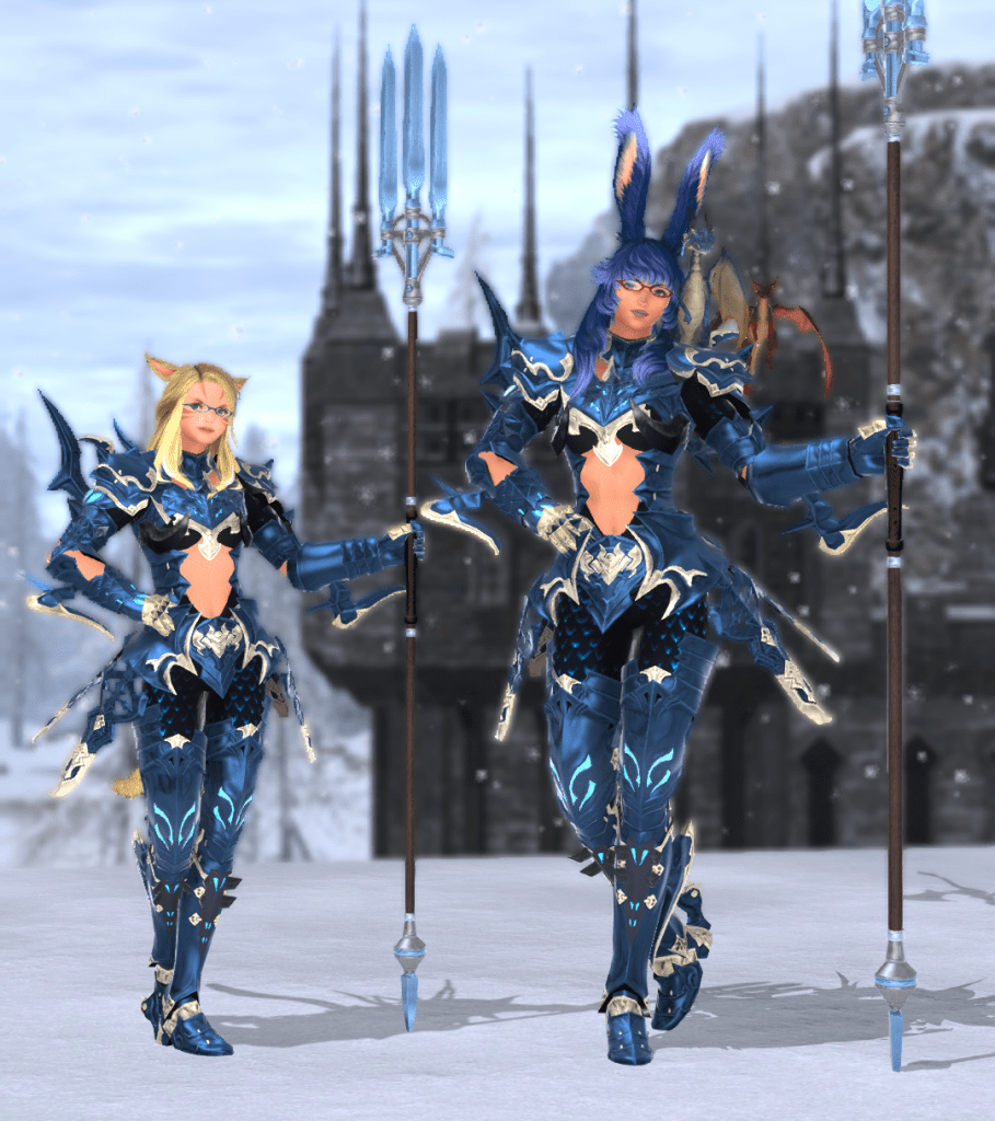 The Little One and I posing in Dragoon Armor in the snow. From Final Fantasy XIV.