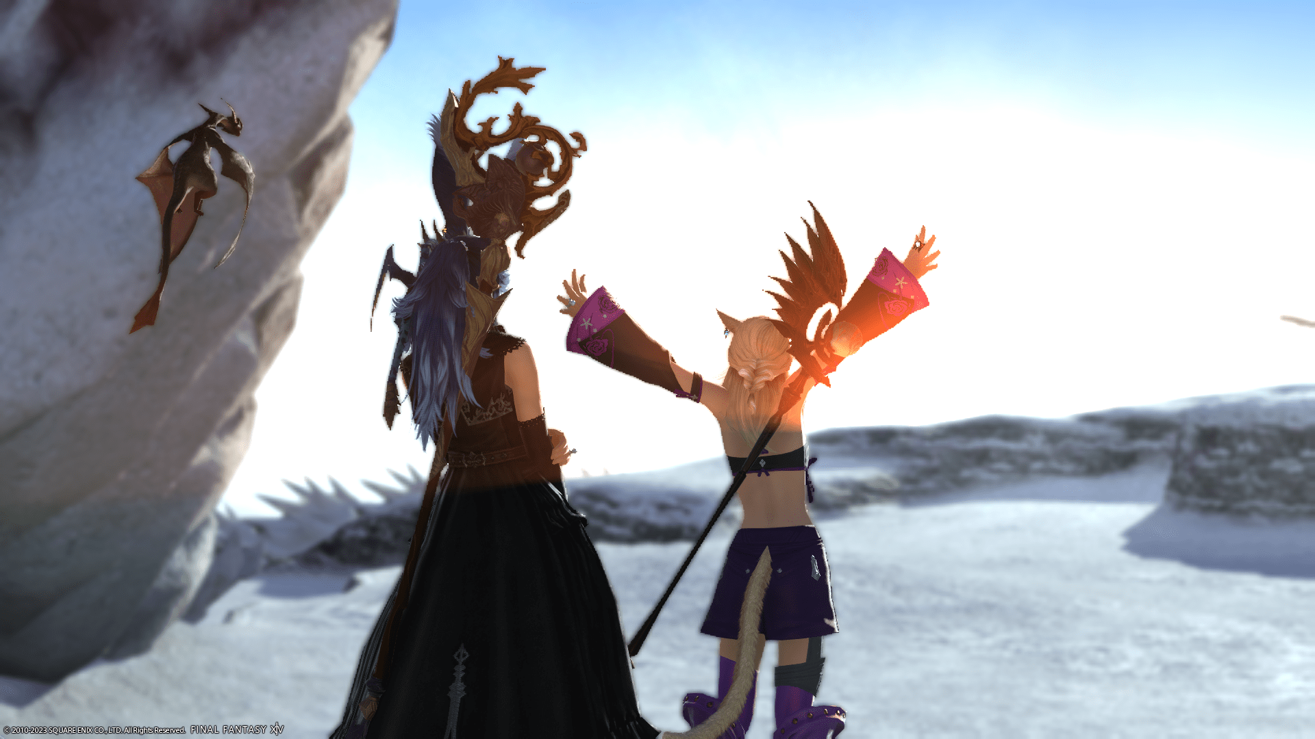 Little One and I staring at a sunrise in Final Fantasy XIV