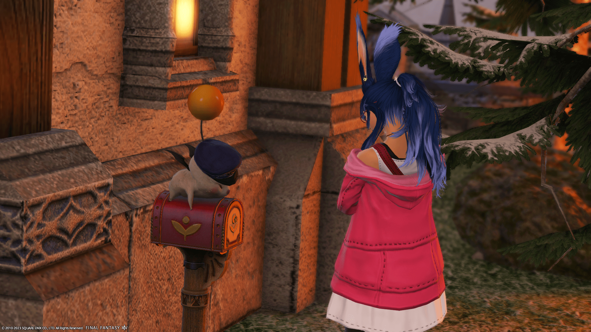 Me in a pink hoodie looking at a moogle mailbox in Final Fantasy XIV.