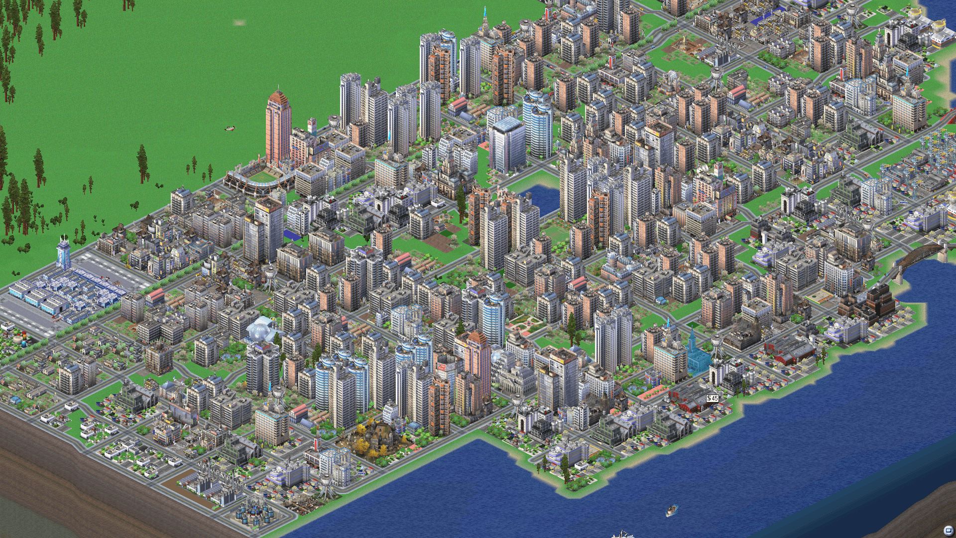Isometric Aerial View from SimCity 3000 showing a large portion of a city next to a coastline.
