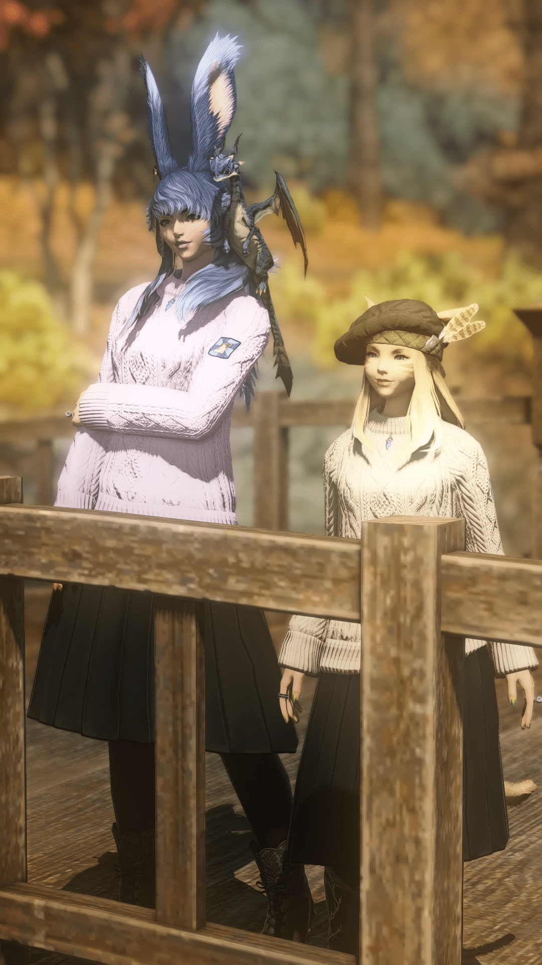 Aikirees and I on a wooden bridge wearing sweaters and long skirts.