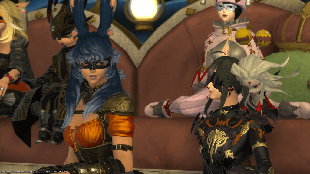 T'zraha and I sitting together for a Masquerade Event.