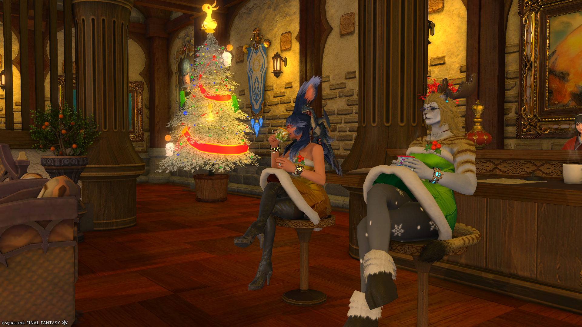 Aikirees and I relaxing in EOCA HQ's Lounge in our festive Starlight dresses drinking out of mugs.