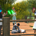 Reinylla cheering on Elizara while she plays a game of Triple Triad.