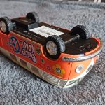 Wind-Up toy of a classic VW Microbus flipped upside down.