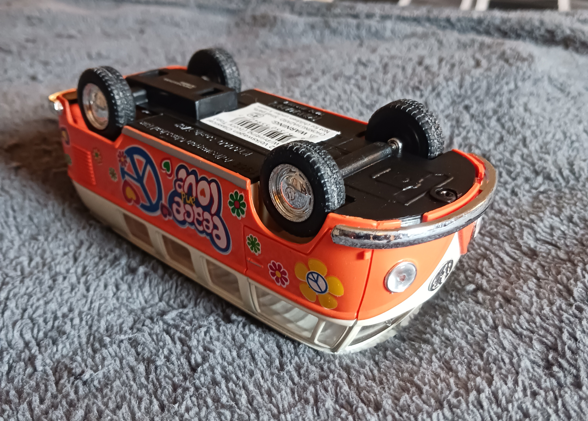 Wind-Up toy of a classic VW Microbus flipped upside down.