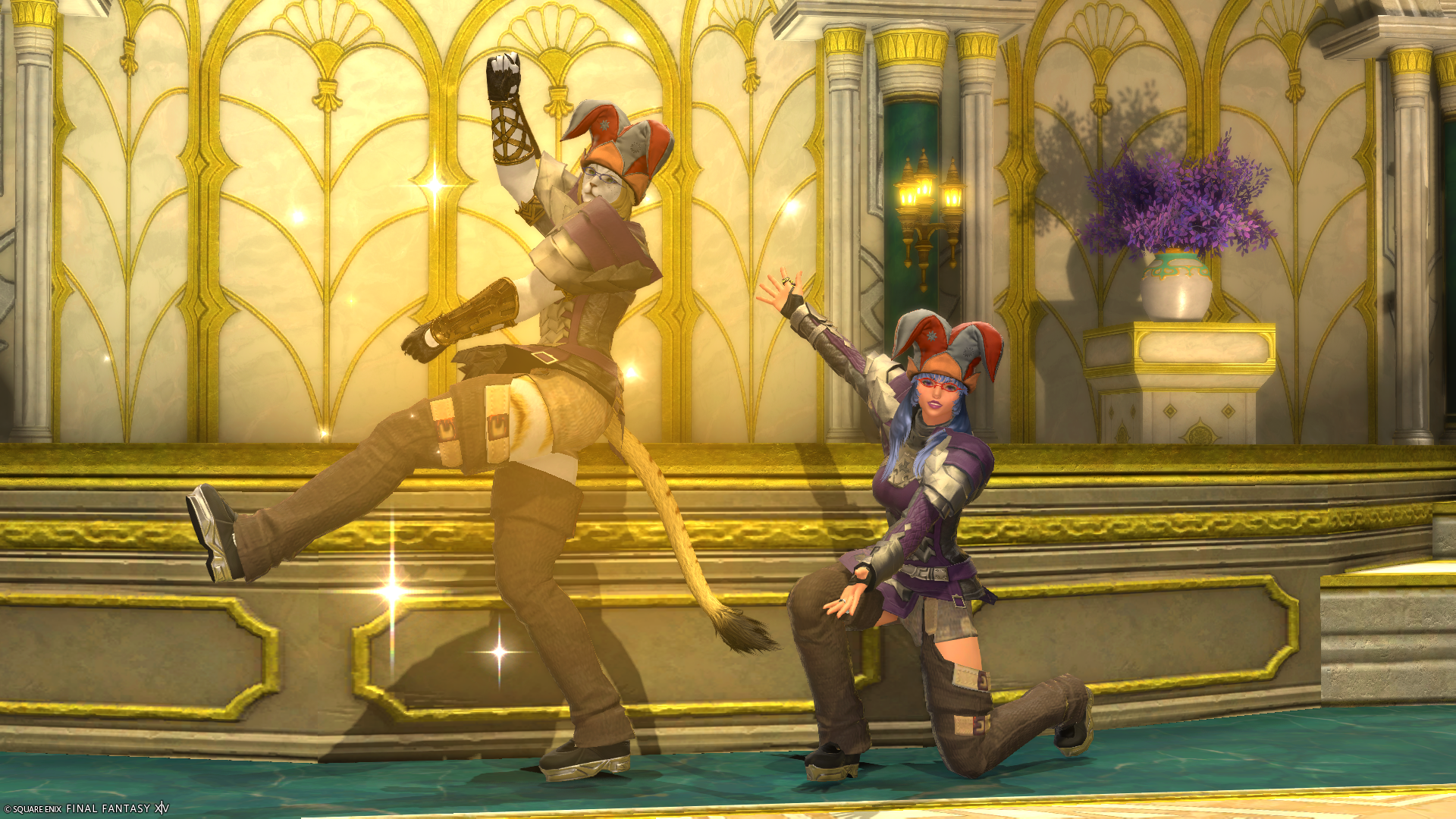 Aikirees and I wearing jester caps in scale mail being silly.